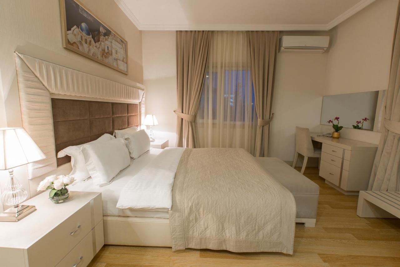 Gabala Garden Hotel Exterior foto A bedroom in a hotel